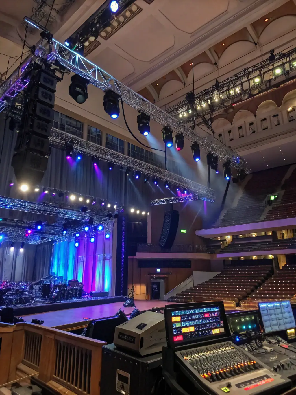 A stage with dynamic lighting effects and decorative elements for a cultural performance, highlighting the visual enhancement capabilities of ASS LA BOITE A MATOS's lighting and staging solutions.